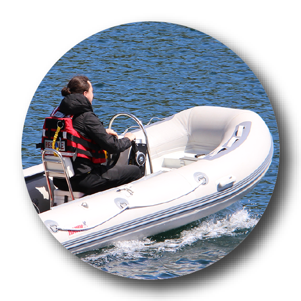 Man cruising on an inflatable boat 